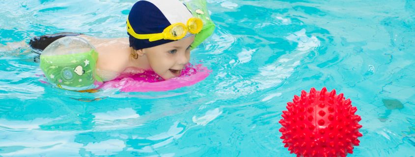 child in swimming pool
